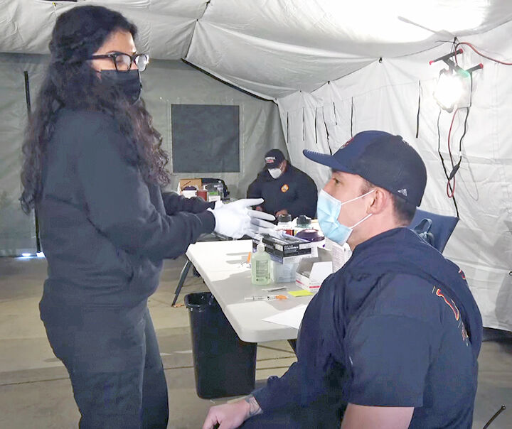 Redlands firefighter among the first to get vaccinated.